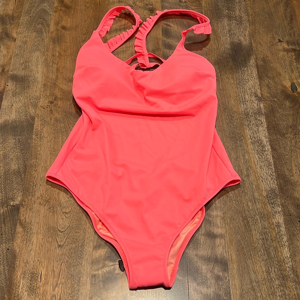 Victoria’s Secret One piece Coral bathing suit. Never worn.